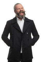 bearded hipster in white shirt and jacket shouts joyfully on white background