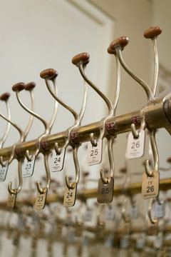 Cloakrooms service in luxurious restaurant with number tags