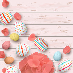 Congratulatory easter eggs on white shabby white wooden background. Easter colorful eggs with different simple doodle ornaments and hydrangea