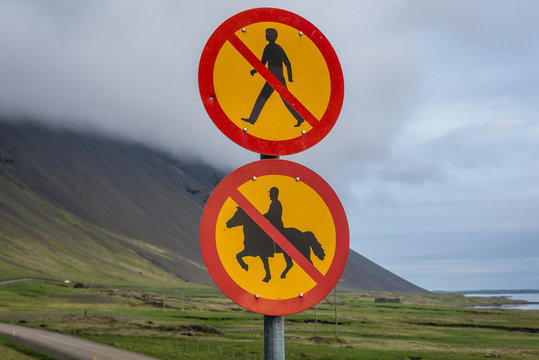 No walking and no horse riding signs near Almannaskard Tunnel on the national Route 1 in Iceland
