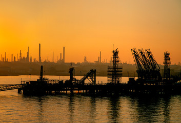 Naklejka premium Oil Refinery at Sunset