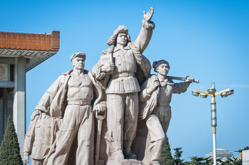 Fototapeta na wymiar Revolutionary monument in front of Mao's Mausoleum on Tiananmen Square in Beijing, China