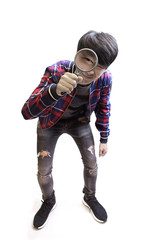 Asian young man searching through magnification glass on white background