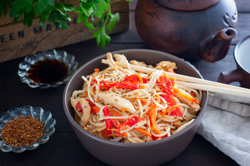 Rice noodles with chicken and vegetables, Korean cuisine, horizontal