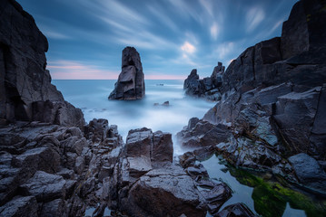 Mysterious dawn / Long exposure seascape with sea rocks at the Black Sea coast near Sozopol,...