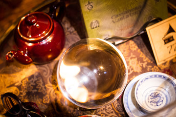 Obraz na płótnie Canvas divination ball to read the future with tea next door