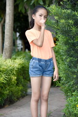 Fototapeta premium Coughing Youthful Asian Female