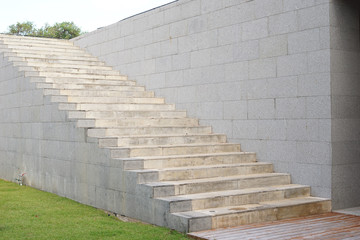 Outdoor exterior cement stair in garden to second floor. Minimalist style exterior