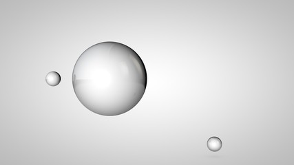 3D illustration of black and white balls, one large and two small balls. Spheres in the air, isolated on a white background. 3D rendering of an abstraction. Space with geometric, round objects.