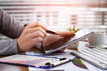 female hand with objects for doing business in the office