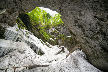 Fototapeta na wymiar Underground glacier in Glaciers Cave in Apuseni mountains, Scarisoara, Romania. 