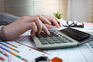 female hand with objects for doing business in the office