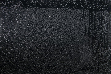 abstract background of air bubbles on glass under water