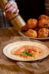 fish garnished with vegetables