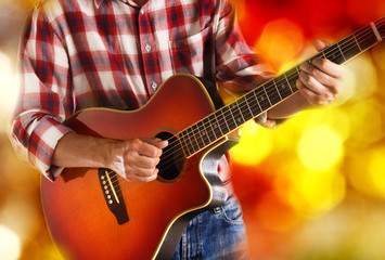 Obraz na płótnie Canvas american country guitarist on stage