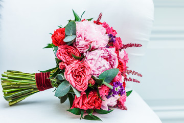 Wedding bouquet of flowers near a window