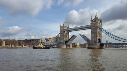 Fototapeta na wymiar Tower Bridge open on the River Thames