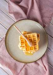 Waffles with blackcurrant jam.