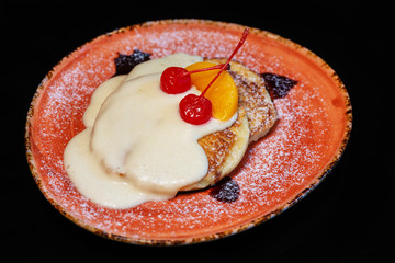 pancakes with gravy and cherry