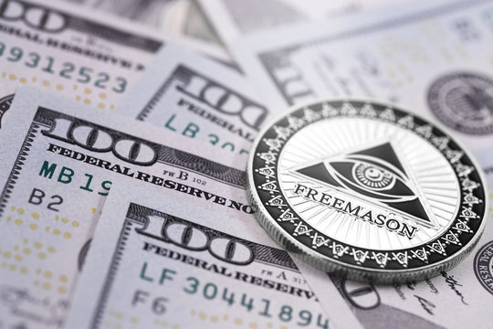 dollars with symbol of freemasonry