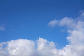 Blue summer sky with white clouds
