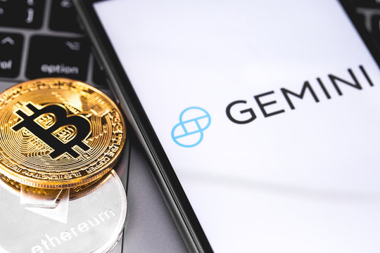 Gemini logo of crypto-exchange on the screen smartphone. MT.GOX is popular largest cryptocurrency exchange on the market. Moscow, Russia - February 13, 2019