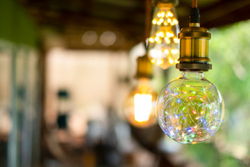 Classic retro incandescent led electric lamp on burred background, Vintage light bulb