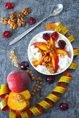 Healthy breakfast or snack curd with fruit and nuts. The concept of nutrition for weight loss. Keto breakfast. Keto lunch idea. 