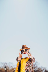 Self portrait of beautiful young woman with mobile. Selfie Concept.