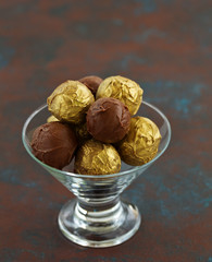 Handmade candies. Lawyer truffle with liqueur and vanilla. Home sweetness. Selective focus.