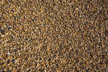 Rolling stones sand texture of Costa Dorada