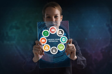 The concept of business, technology, the Internet and the network. A young entrepreneur working on a virtual screen of the future and sees the inscription: Unlock your potential