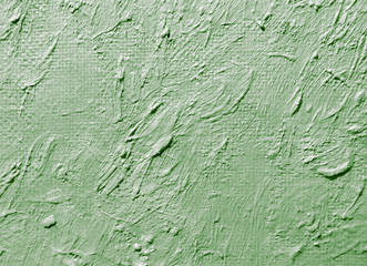 Green oil paint on canvas as abstract background