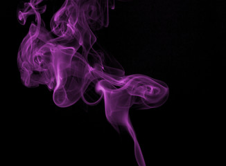 Obraz premium Abstract colorful smoke on black background, fire design
