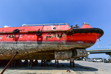 Fototapeta premium Close-ups of various vessels undergoing maintenance and repair
