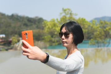 traveling woman selfie at Xiangshan Visitor Center