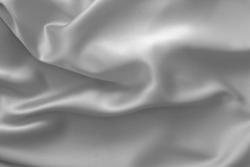 Rippled white silk fabric satin cloth waves background