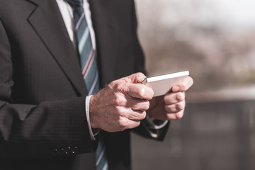 Businessman using mobile phone