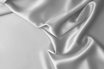 Rippled white silk fabric satin cloth waves background