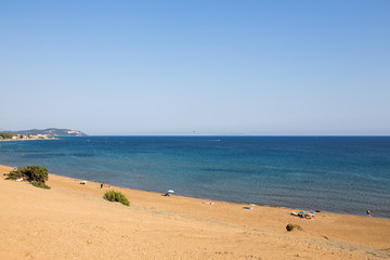 Fototapeta na wymiar A view of beach on Corfu, Greece, one of the Island's most popular resorts