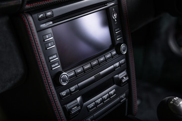 Fototapeta na wymiar Infotainment system in luxury car interior