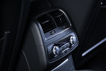 Fototapeta na wymiar Passenger air conditioning controls in car interior