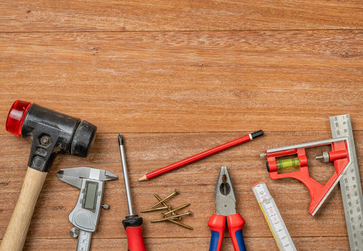 Tools on a wooden background with copy space