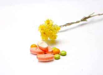 Helichrysum flower and medicine pills