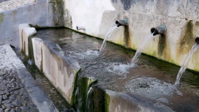 Slowmotion video of La Jaula fountain, Monda, Malaga, Spain