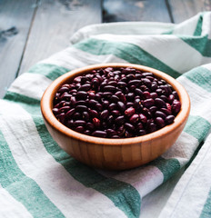 Dried red beans in bamboo bowl