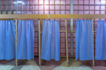 Illustrative image of the election in a democratic society. Elections in Ukraine. The process of voting at a polling station. Empty voting booths at a polling station.