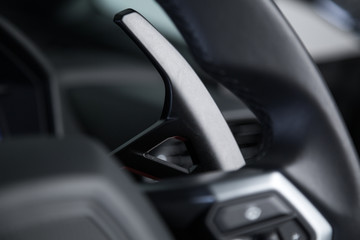 Naklejka premium Paddle shifting in sports car interior