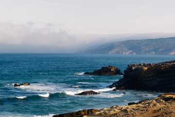 Fototapeta na wymiar Onde a Terra e o Mar se tocam, Guincho, Cascais, Portugal