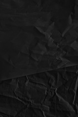 Dark black paper background creased crumpled posters old torn ripped surface grunge textures placard backdrop empty space for text